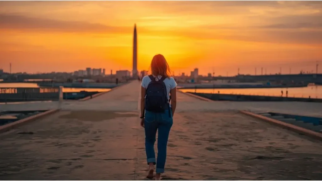 Mulher sozinha observando fogos na Passarela do Descobrimento, Porto Seguro, janeiro de 2026